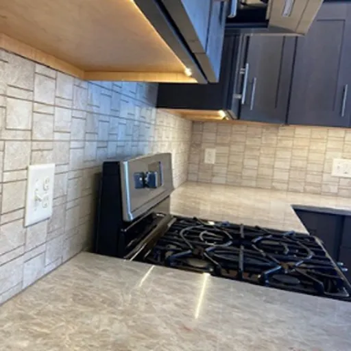 Stone countertop with black range 